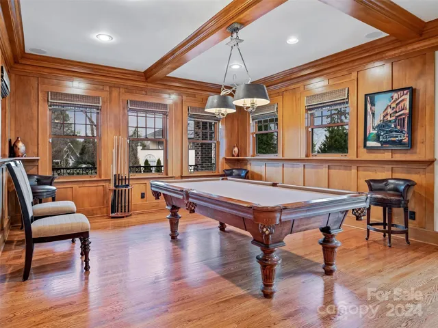 Back inside, you'll delight in this stellar Billiard Area. Game On!