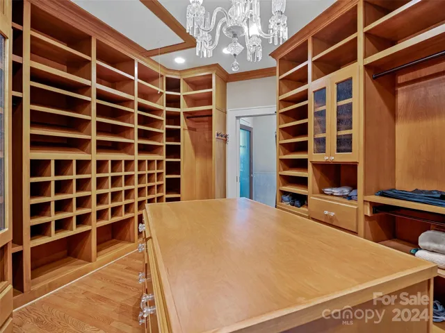 The Primary Suite's custom walk-in closet extraordinaire