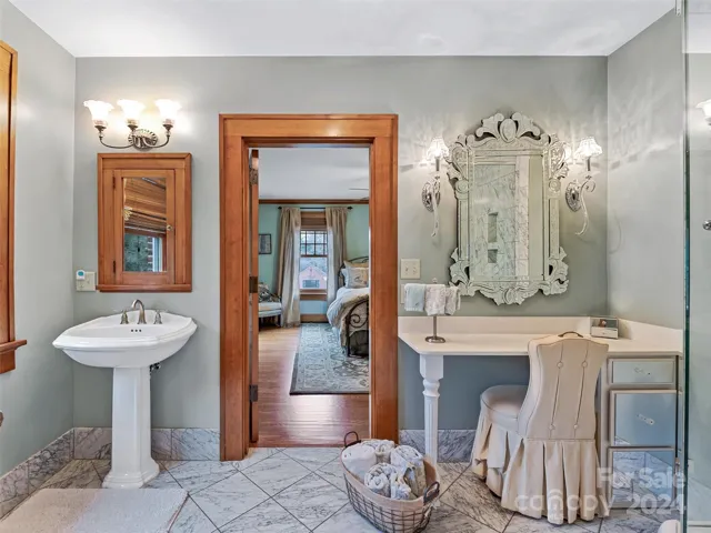 One of two guest bathrooms in a jack-and-jill configuration