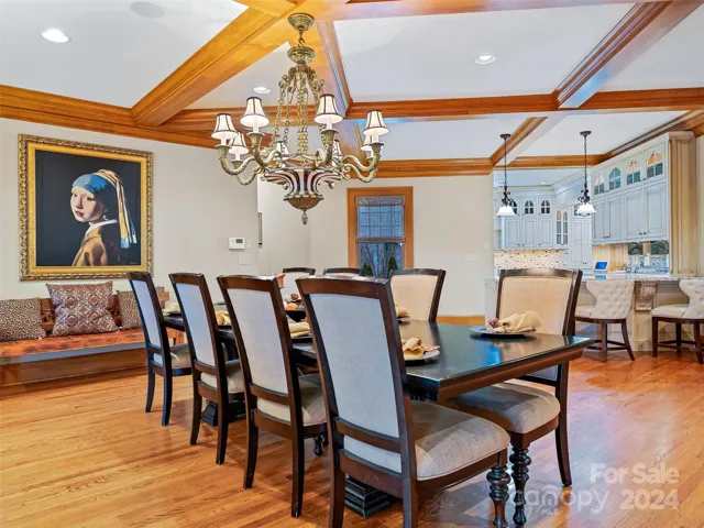 The coffered ceilings add a timeless architectural detail