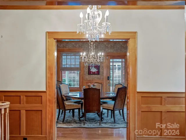 For more stately entertaining, through some beautiful glass French doors, the foyer leads you to...
