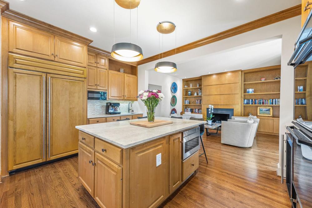 Wood faced refrigerator and freezer. Exceptional lighting.
