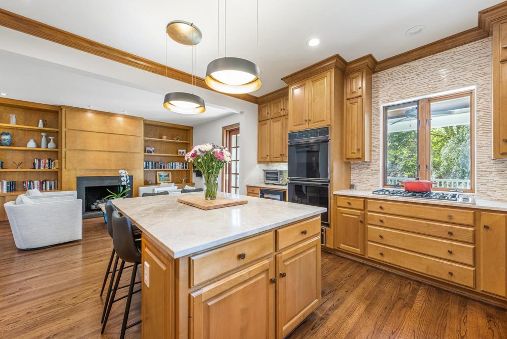 Double ovens and lots of cabinet, counter and drawer space.