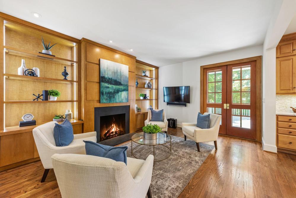 Family sitting area open to the kitchen with access to the covered deck.