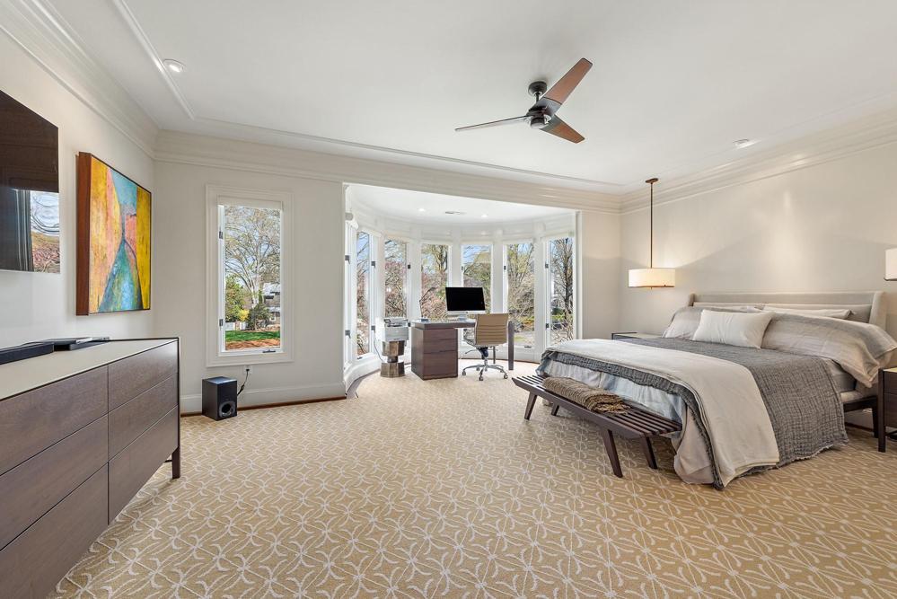 Primary bedroom has beautiful lighting and alcove for reading or writing your own novel!