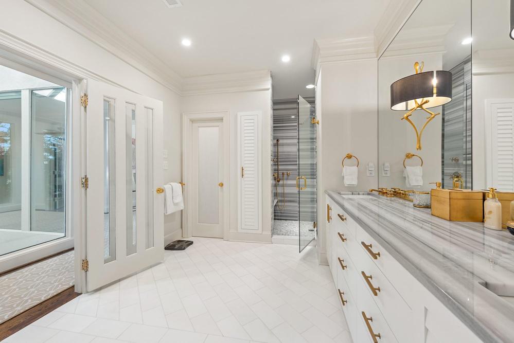 Primary bath with large shower, and water closet.