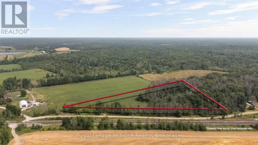 4 acre Lot with 900 ft frontage