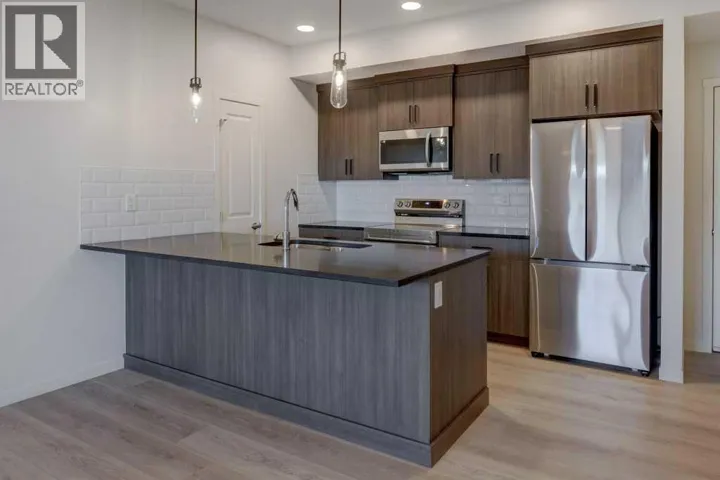 211, 245 Edith Place NW, Calgary, Alberta T3R2C9