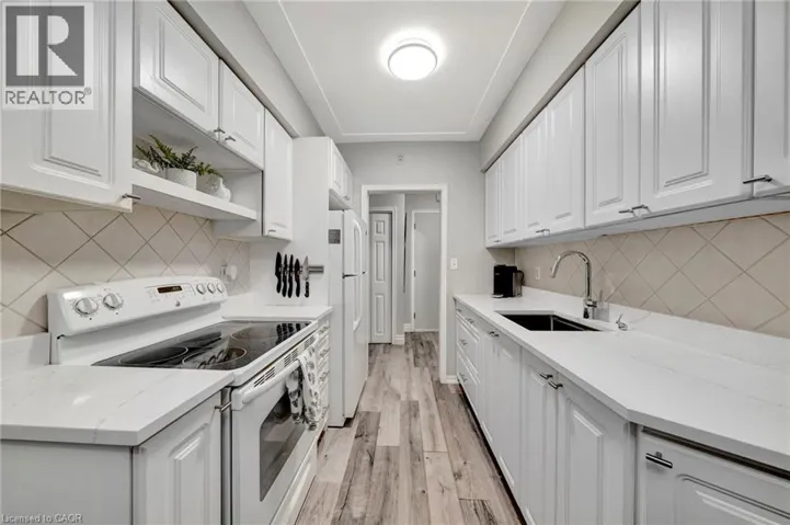 11 WOODMAN Drive S Unit# 307, Hamilton, Ontario L8K4E3