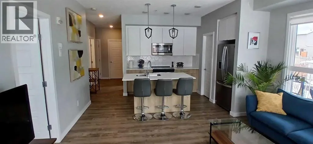 102, 1605 17 Street SE, Calgary, Alberta T2G2L7