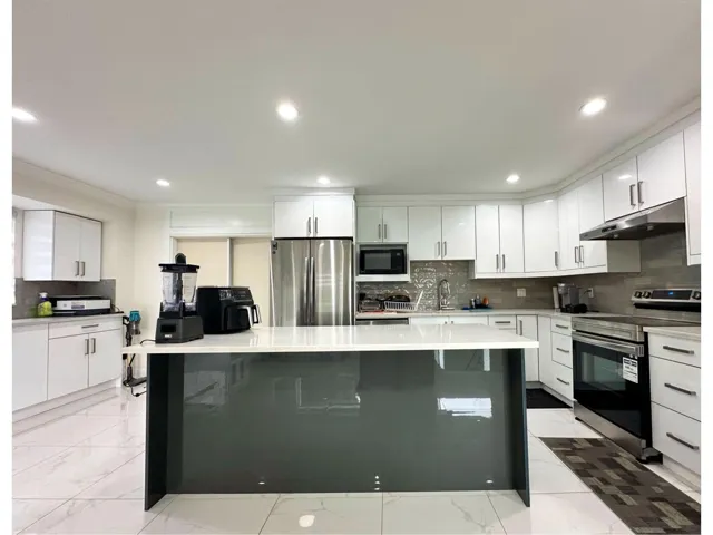 13017 64 AVENUE, Surrey, British Columbia V3W1X8