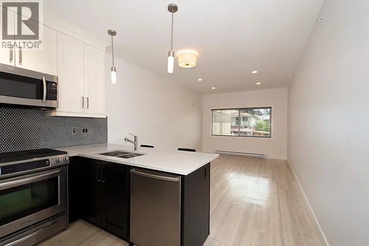 203 4548 HASTINGS STREET, Burnaby, British Columbia V5C2K4