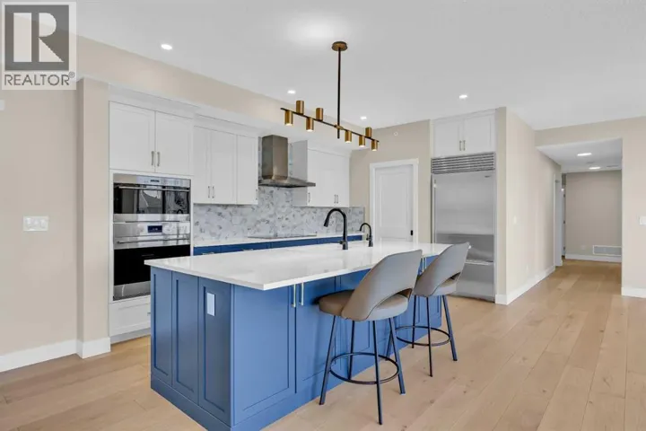 409, 15 Cougar Ridge Landing SW, Calgary, Alberta T3H6C3