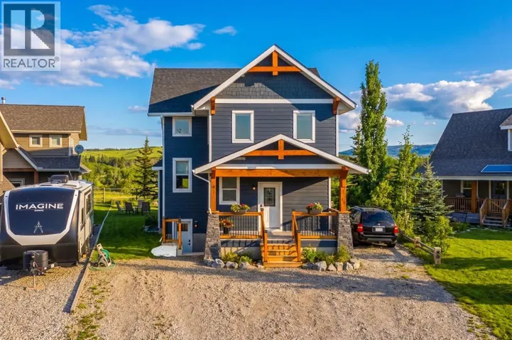 216 Cottageclub Crescent, Rural Rocky View County, Alberta T4C1B1
