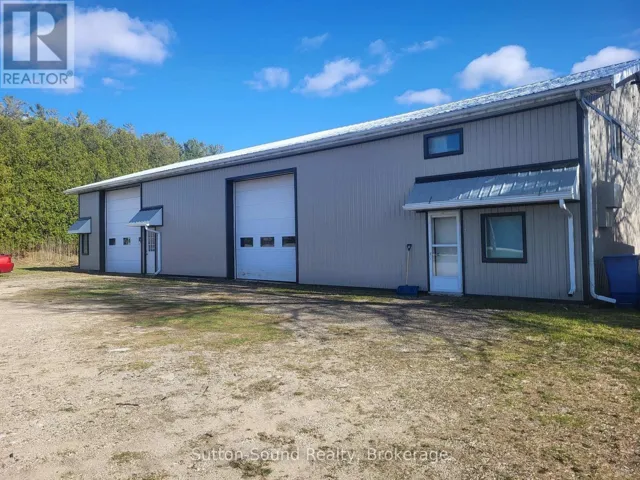Large 2 bay shop with 3 bed house