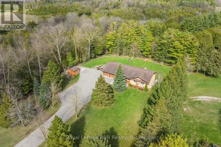 Waterfront acreage with bungalow and 2 sheds