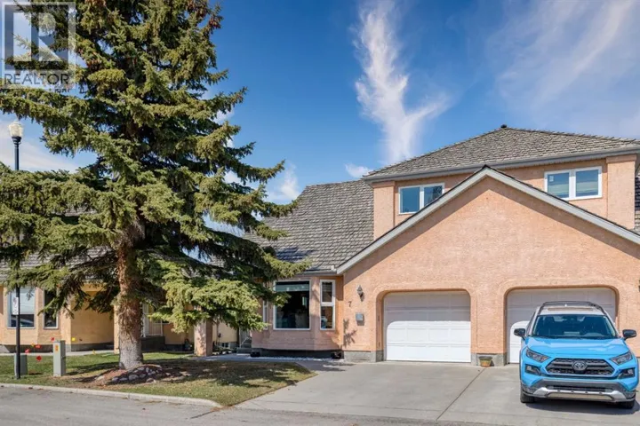 7, 26 Quigley Drive, Cochrane, Alberta T4C1M2