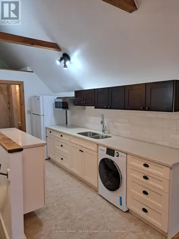 Newly renovated kit. with  combination wash/dryer