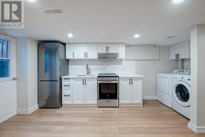 LOWER - 3 MURIEL AVENUE, Toronto (Danforth), Ontario M4J2X8