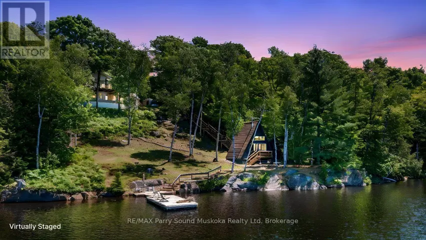 390' Waterfront on pristine Long Lake!