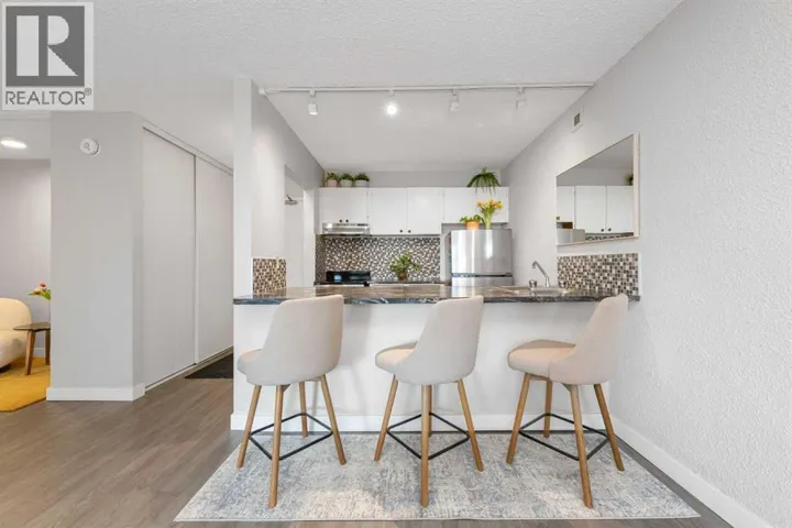2003, 221 6 Avenue SE, Calgary, Alberta T2G4Z9