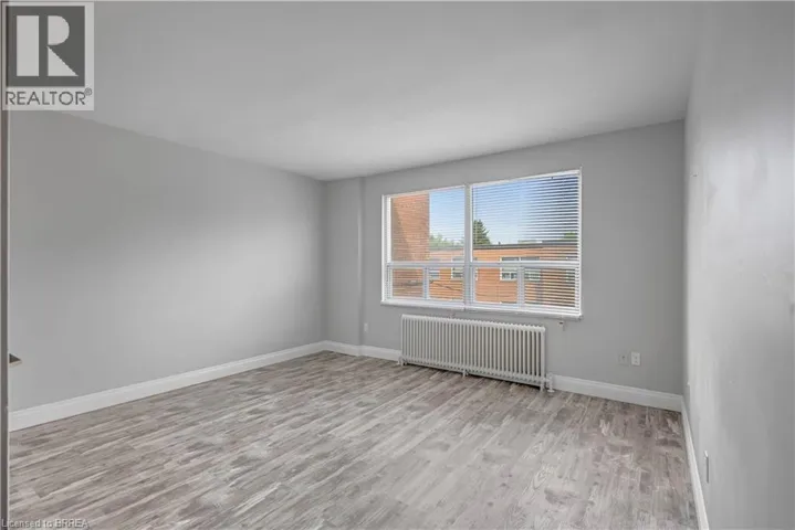 57 MERICOURT Road Unit# 310, Hamilton, Ontario L8S2N5