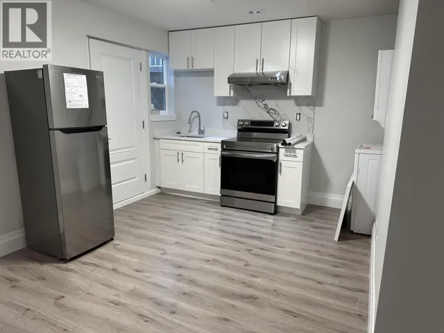 2000 W 48TH AVENUE, Vancouver, British Columbia V6M2P4