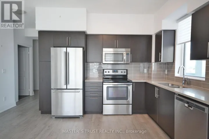 703 - 65 SPEERS ROAD, Oakville (CO Central), Ontario L6K0J1