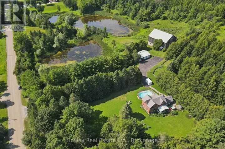 88 acre farm with 3 ponds, barn, shop with garage
