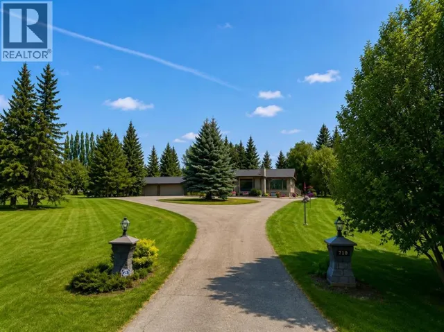 710 Bearspaw Village Drive, Rural Rocky View County, Alberta T3L2P3
