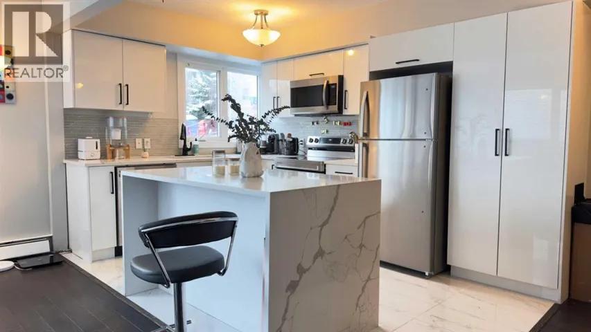 104, 1508 23 Avenue SW, Calgary, Alberta T2T0T7