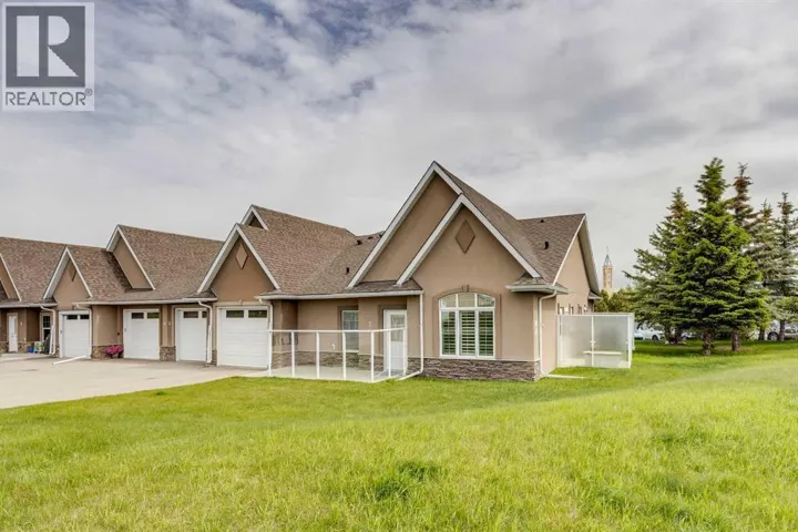 2, 20 River Heights View, Cochrane, Alberta T4C0M9