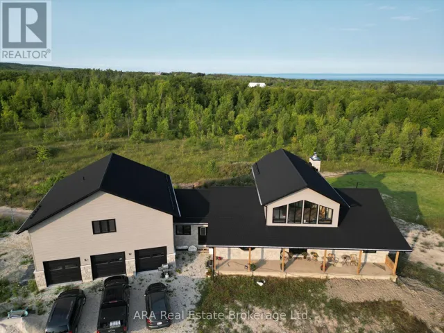 Bungaloft with walk-out basement and heated 3 car