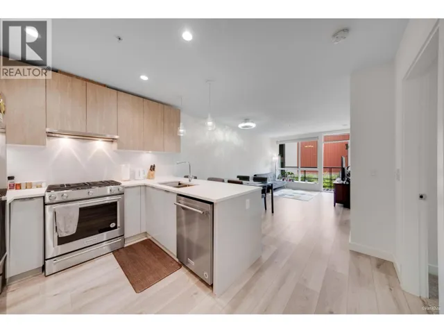 207 128 E 8TH STREET, North Vancouver, British Columbia V7L1Y7