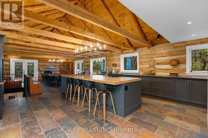 In-floor heating (throughout slate area -log wing)
