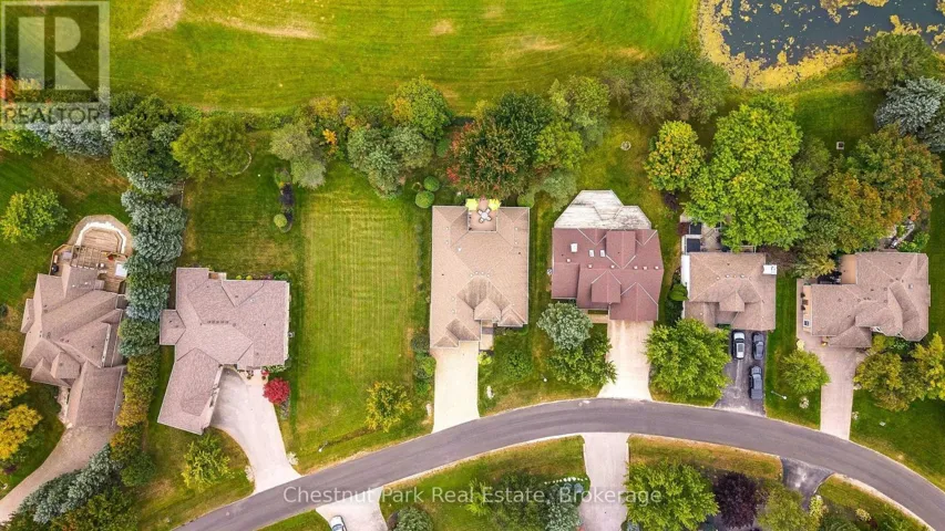 Aerial view of the property with umbrellas on deck