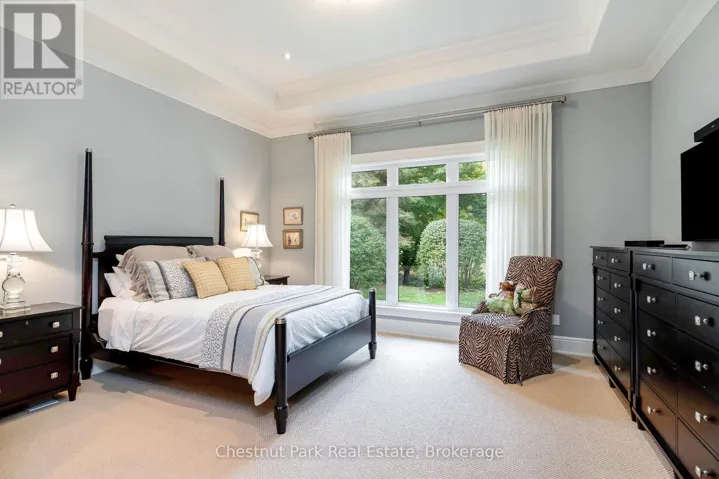 Primary bedroom suite w/views to the golf course