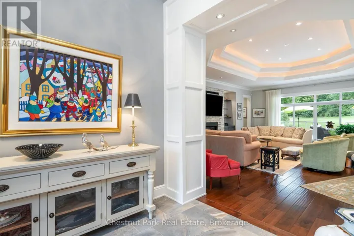 The grand front foyer leading into the home