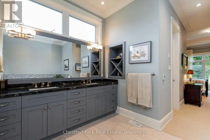 Luxurious flooring and double vanity in ensuite