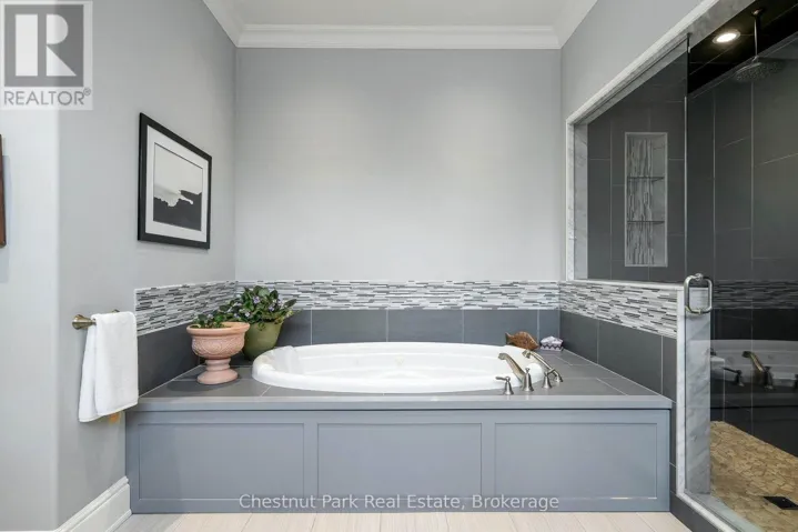 Large soaker tub in the 5 piece primary ensuite