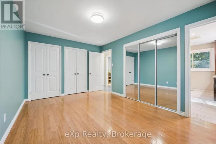 Mainfloor Primary Bdrm with THREE Closets