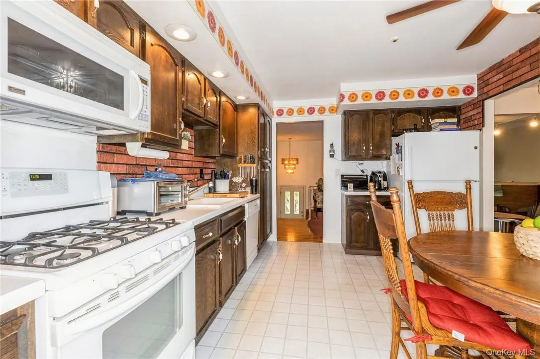 Eat in kitchen with sliders to brand new deck Eat in kitchen with sliders to brand new deck