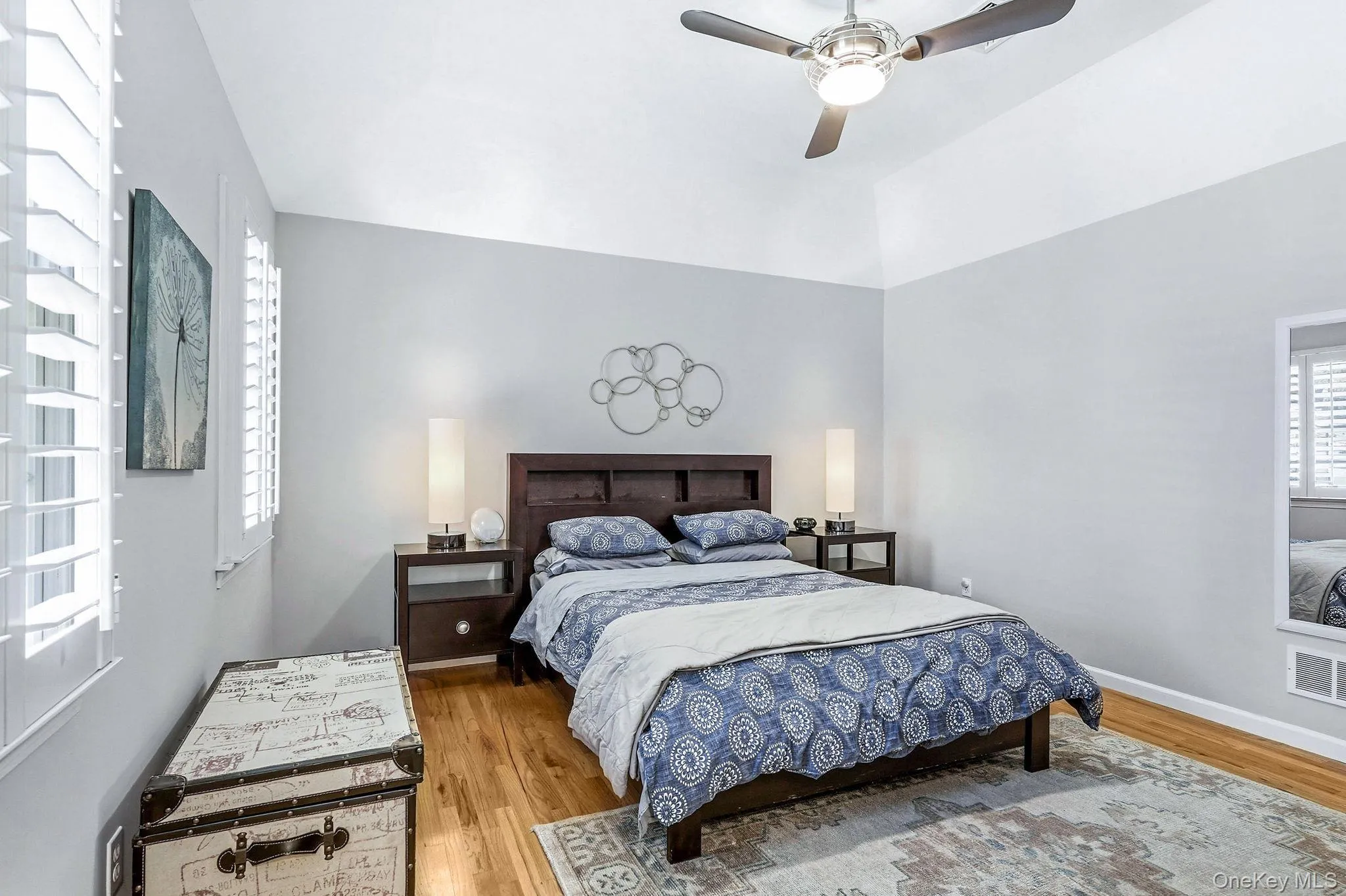 Hardwood flooring paired with light gray walls and white trim Hardwood flooring paired with light gray walls and white trim