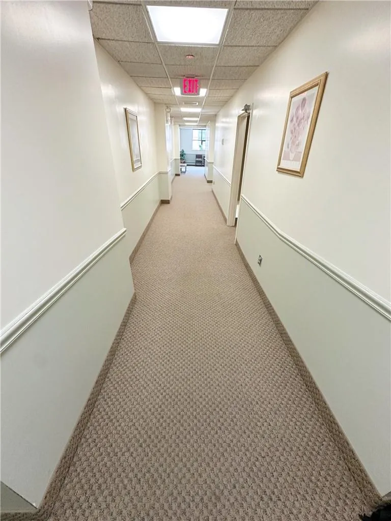 Hallway to shared bathrooms Hallway to shared bathrooms