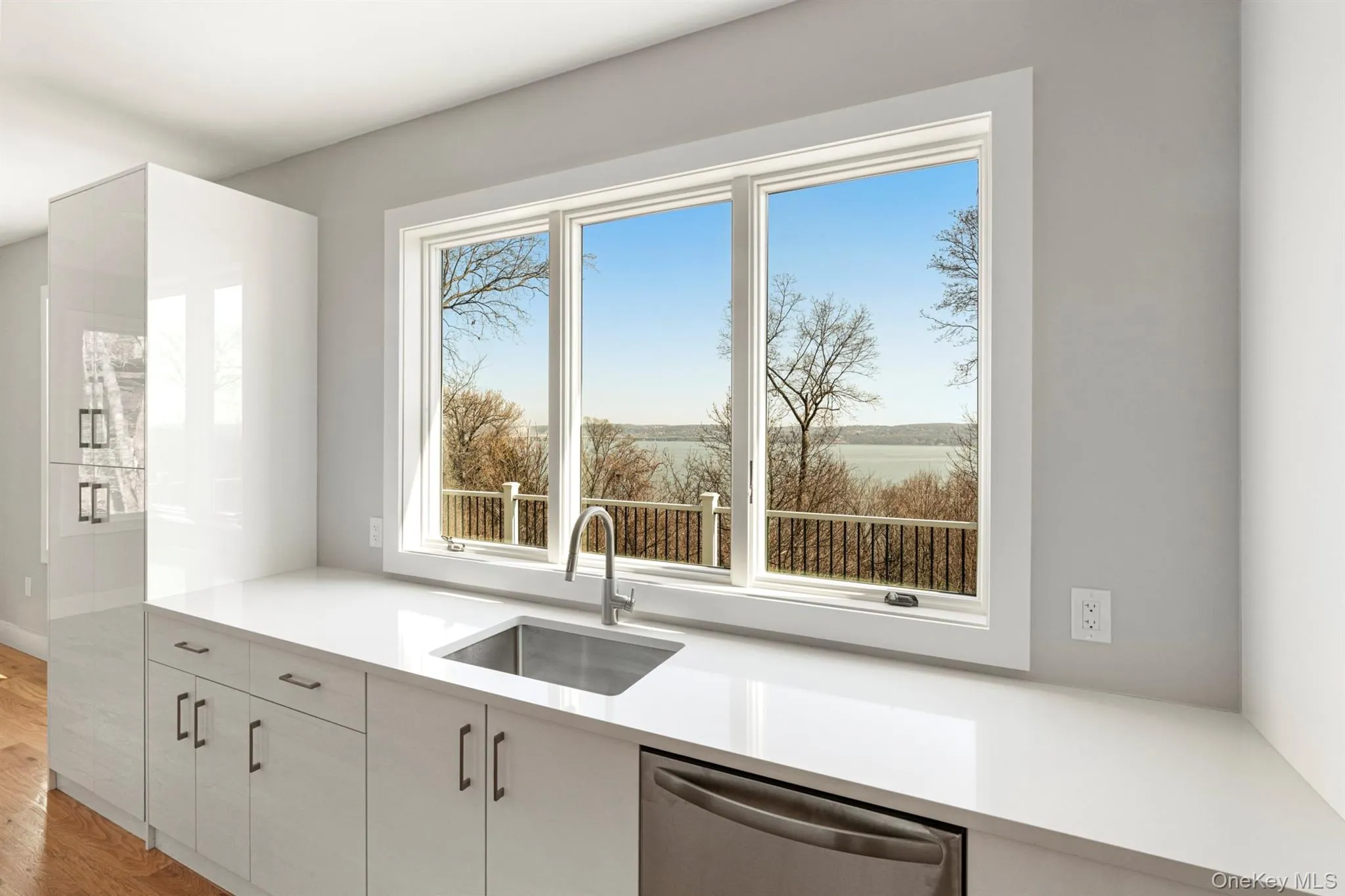 View out the kitchen window with custom cabinetry View out the kitchen window with custom cabinetry