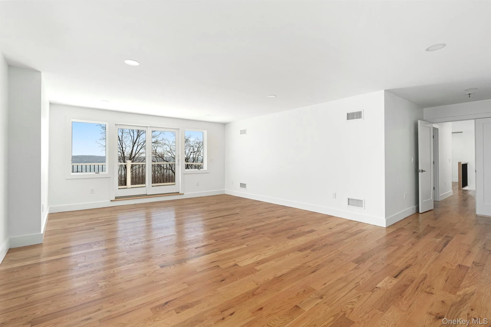 Generously sized Primary En Suite with deck access and Hudson River views Generously sized Primary En Suite with deck access and Hudson River views