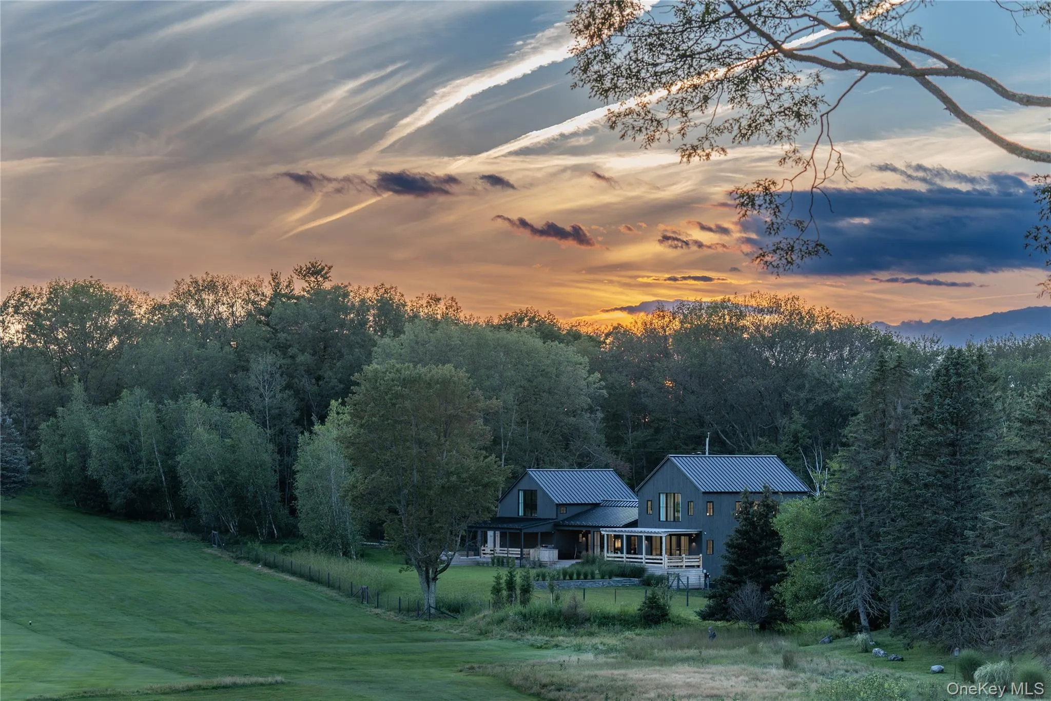 Aerial view at dusk, home and backyard Aerial view at dusk, home and backyard