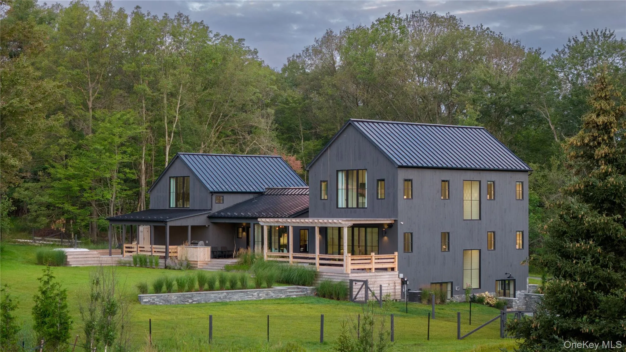 Back of house with yard Back of house with yard