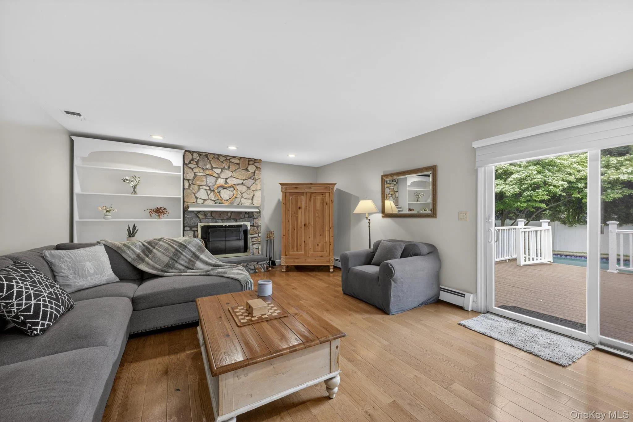 Family room with wood burning fireplace. Family room with wood burning fireplace.
