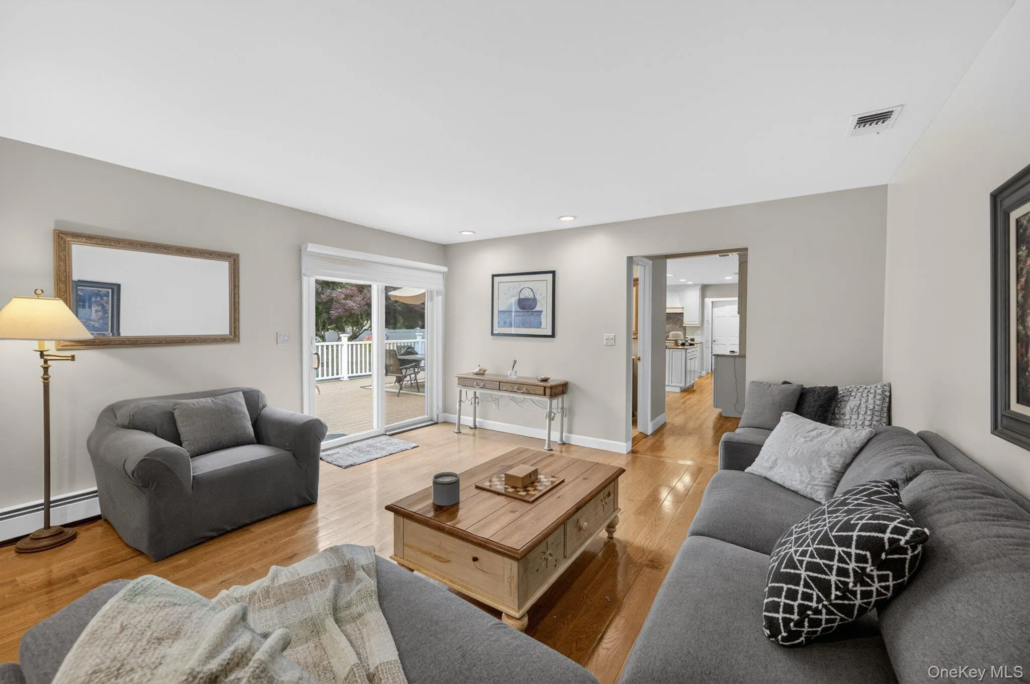 Family room has sliders out to a breathtaking backyard. Family room has sliders out to a breathtaking backyard.